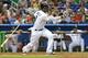 MIAMI, FL - JULY 24: Hanley Ramirez #2 of the Miami Marlins hits a sacrafice fly during a game against the Atlanta Braves at Marlins Park on July 24, 2012 in Miami, Florida. (Photo by Sarah Glenn/Getty Images)
