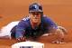 ST. PETERSBURG, FL - SEPTEMBER 05: Infielder Evan Longoria #3 of the Tampa Bay Rays slides head first into third base against the Texas Rangers during the game at Tropicana Field on September 5, 2011 in St. Petersburg, Florida. (Photo by J. Meric/Getty Images)