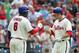 PHILADELPHIA - JULY 21: Second baseman Chase Utley #26 of the Philadelphia Phillies is greeted by first baseman Ryan Howard #6 after hitting solo home run during a game against the San Francisco Giants at Citizens Bank Park on July 21, 2012 in Philadelphia, Pennsylvania. (Photo by Hunter Martin/Getty Images)