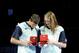 OMAHA, NE - JULY 2: Michael Phelps and Missy Franklin react after receiving their Omega watches for Male and Female swimmer of the meet after day eight of the 2012 U.S. Olympic Swimming Team Trials at the CenturyLink Center July 2, 2012 in Omaha, Nebraska. (Photo by Eric Francis/Getty Images)