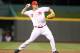CINCINNATI, OH - JULY 18: Scott Rolen #27 of the Cincinnati Reds throw the ball to first base during the game against the Arizona Diamondbacks at Great American Ball Park on July 18, 2012 in Cincinnati, Ohio. (Photo by Andy Lyons/Getty Images)