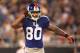 CHARLOTTE, NC - AUGUST 13: Victor Cruz #80 of the New York Giants against the Carolina Panthers during their preseason game at Bank of America Stadium on August 13, 2011 in Charlotte, North Carolina. (Photo by Streeter Lecka/Getty Images)