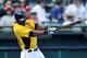 March 16, 2012; Bradenton, FL, USA; Pittsburgh Pirates center fielder Starling Marte (64) singles in the third inning against the Philadelphia Phillies at McKechnie Field. The Pirates defeated the Phillies 3 - 2. Mandatory Credit: Joy R. Absalon-US PRESSWIRE