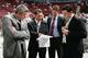 VANCOUVER, BC - JUNE 24: (L-R) Assistant coach Todd McLellan, general manager Ken Holland, head coach Mike Babcock, and video coach Jay Woodcroft of the Detroit Red Wings convene during the 2006 NHL Draft held at General Motors Place on June 24, 2006 in Vancouver, Canada. (Photo by Jeff Vinnick/Getty Images)