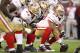 Jonathan Goodwin (No. 59) is the starting center.