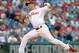 July 24, 2012; Philadelphia, PA USA; Philadelphia Phillies starting pitcher Cliff Lee (33) throws during first inning of the game against the Milwaukee Brewers at Citizens Bank Park. Mandatory Credit: Eric Hartline-US PRESSWIRE