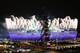 LONDON, ENGLAND - JULY 27: Fireworks over the Olympic Stadium during the Opening Ceremony of the London 2012 Olympic Games near Olympic Park on July 27, 2012 in London, England. (Photo by Clive Brunskill/Getty Images)