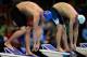 OMAHA, NE - JUNE 27: (L-R) Ryan Lochte and Michael Phelps stand on the starting block as they prepare to compete in the championship final of the Men's 200 m Freestyle during Day Three of the 2012 U.S. Olympic Swimming Team Trials at CenturyLink Center on June 27, 2012 in Omaha, Nebraska. (Photo by Jamie Squire/Getty Images)