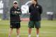 CORTLAND, NY - JULY 27: Tony Sparano, offensive coordinator of the New York Jets talks with general manager Mike Tannenbaum at Jets Training Camp at SUNY Cortland on July 27, 2012 in Cortland, New York. (Photo by Jeff Zelevansky/Getty Images)