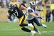 PITTSBURGH, PA - DECEMBER 24: Wide receiver Mike Wallace #17 of the Pittsburgh Steelers rushes past safety Craig Dahl #43 of the St. Louis Rams during the game at Heinz Field on December 24, 2011 in Pittsburgh, Pennsylvania. (Photo by Karl Walter/Getty Images)