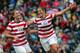 GLASGOW, SCOTLAND - JULY 28: Carli Lloyd of USA (R) celebrates with team-mate Alex Morgan after scoring their third goal during the Women's Football first round Group G match between United States and Colombia on Day 1 of the London 2012 Olympic Games at Hampden Park on July 28, 2012 in Glasgow, Scotland. (Photo by Stanley Chou/Getty Images)