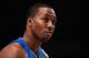 NEW YORK, NY - MARCH 28: Dwight Howard #12 of the Orlando Magic looks on against the New York Knicks at Madison Square Garden on March 28, 2012 in New York City. NOTE TO USER: User expressly acknowledges and agrees that, by downloading and/or using this Photograph, user is consenting to the terms and conditions of the Getty Images License Agreement. (Photo by Chris Trotman/Getty Images)