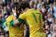 MANCHESTER, UNITED KINGDOM - JULY 29: Alexandre Prato and Neymar of Brazil celebrate a goal during the Men's Football first round Group C Match between Brazil and Belarus on Day 2 of the London 2012 Olympic Games at Old Trafford on July 29, 2012 in Manchester, England. (Photo by Francis Bompard/Getty Images)