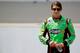 INDIANAPOLIS, IN - JULY 28: Danica Patrick, driver of the #7 GoDaddy.com Chevrolet, stands on the grid during qualifying for the NASCAR Nationwide Series Indiana 250 at Indianapolis Motor Speedway on July 28, 2012 in Indianapolis, Indiana. (Photo by Justin Edmonds/Getty Images for NASCAR)