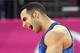 LONDON, ENGLAND - JULY 28: Danell Leyva of the United States reacts after competing in the parralel bars in the Artistic Gymnastics Men's Team qualification on Day 1 of the London 2012 Olympic Games at North Greenwich Arena on July 28, 2012 in London, England. (Photo by Ronald Martinez/Getty Images)