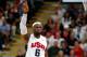 LONDON, ENGLAND - JULY 29: Lebron James #6 of United States points during their Men's Basketball Game against France on Day 2 of the London 2012 Olympic Games at the Basketball Arena on July 29, 2012 in London, England. (Photo by Jamie Squire/Getty Images)