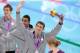 LONDON, ENGLAND - JULY 29: Michael Phelps of the United States celebrates with the silver medal won during the Men's 4 x 100m Freestyle Relay final on Day 2 of the London 2012 Olympic Games at the Aquatics Centre on July 29, 2012 in London, England. (Photo by Adam Pretty/Getty Images)