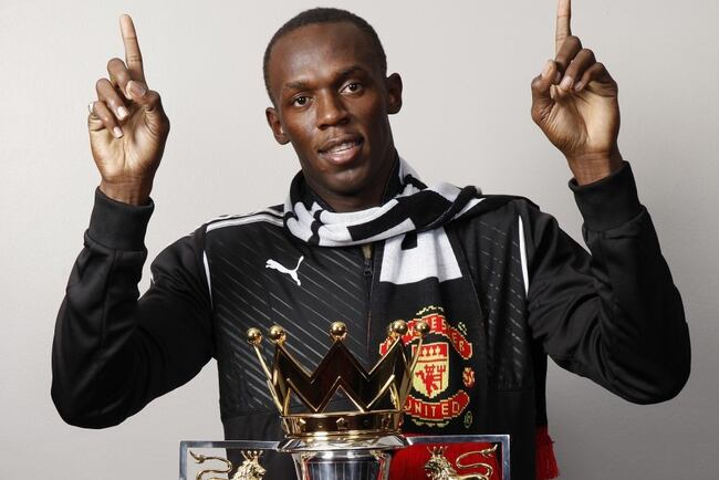 111680-usain-bolt-poses-with-the-premier-league-trophy-in-manchester-in-20091_crop_north