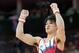 LONDON, ENGLAND - JULY 30: Kohei Uchimura of Japan reacts after competing in the horizontal bar in the Artistic Gymnastics Men's Team final on Day 3 of the London 2012 Olympic Games at North Greenwich Arena on July 30, 2012 in London, England. (Photo by Ronald Martinez/Getty Images)