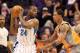 PHOENIX, AZ - DECEMBER 26: Carl Landry #24 of the New Orleans Hornets handles the ball during the season openning NBA game against the Phoenix Suns at US Airways Center on December 26, 2011 in Phoenix, Arizona. The Hornets defeated the Suns 85-84. NOTE TO USER: User expressly acknowledges and agrees that, by downloading and or using this photograph, User is consenting to the terms and conditions of the Getty Images License Agreement. (Photo by Christian Petersen/Getty Images)