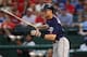 ARLINGTON, TX - JULY 08: Justin Morneau #33 of the Minnesota Twins at bat against the Texas Rangers at Rangers Ballpark in Arlington on July 8, 2012 in Arlington, Texas. (Photo by Ronald Martinez/Getty Images)
