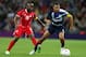 LONDON, ENGLAND - JULY 29: Ryan Giggs (R) of Great Britain tangles with Ismail Matar of United Arab Emirates during the Men's Football first round Group A Match between Great Britain and United Arab Emirates on Day 2 of the London 2012 Olympic Games at Wembley Stadium on July 29, 2012 in London, England. (Photo by Julian Finney/Getty Images)