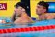 OMAHA, NE - JUNE 26: (L-R) Michael Phelps and Ryan Lochte look on after they competed in the second semifinal heat of the Men's 200 m Freestyle during Day Two of the 2012 U.S. Olympic Swimming Team Trials at CenturyLink Center on June 26, 2012 in Omaha, Nebraska. (Photo by Jamie Squire/Getty Images)