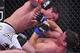 Jan 28, 2012; Chicago, IL, USA; UFC fighter Chael Sonnen (top) fights against Michael Bisping during UFC on Fox 2 at the United Center. Sonnen defeats Bisping. Mandatory Credit: Mike Dinovo-US PRESSWIRE