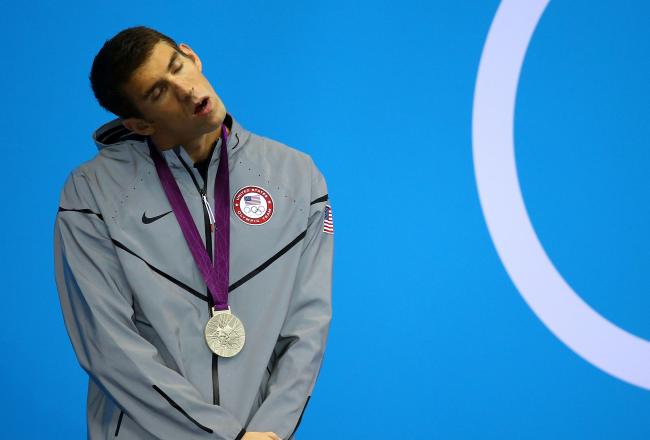 Psst! Michael! Everyone's analyzing your body language even though you're just getting ready for another race.