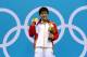 LONDON, ENGLAND - JULY 31: Gold medallist Shiwen Ye of China poses on the podium during the medal ceremony in the Women's 200m Individual Medley final on Day 4 of the London 2012 Olympic Games at the Aquatics Centre on July 31, 2012 in London, England. (Photo by Clive Rose/Getty Images)