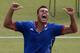 LONDON, ENGLAND - JULY 31: Jo-Wilfried Tsonga of France celebrates after defeating Milos Raonic of Canada in the second round of Men's Singles Tennis on Day 4 of the London 2012 Olympic Games at Wimbledon on July 31, 2012 in London, England. (Photo by Clive Brunskill/Getty Images)