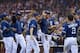 July 21, 2012; San Diego, CA, USA; San Diego Padres right fielder Will Venable (one from right) is congratulated by shortstop Everth Cabrera (2) and third baseman Chase Headley (7), after making a diving catch to end the top of the eleventh inning against the Colorado Rockies as Padres second baseman Alexi Amarista (left) and center fielder Cameron Maybin (one from left) look on at PETCO Park. Mandatory Credit: Jake Roth-US PRESSWIRE