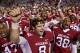 FAYETTEVILLE, AR - NOVEMBER 12: Quarterback Tyler Wilson #8 of the Arkansas Razorbacks sings the fight song with his teammates after a win against the Tennessee Volunteers at Donald W. Reynolds Stadium Stadium on November 12, 2011 in Fayetteville, Arkansas. The Razorbacks defeated the Volunteers 49 to 7. (Photo by Wesley Hitt/Getty Images)