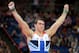 LONDON, ENGLAND - AUGUST 01: Kristian Thomas of Great Britain raises his arms after competing on the pommel horse in the Artistic Gymnastics Men's Individual All-Around final on Day 5 of the London 2012 Olympic Games at North Greenwich Arena on August 1, 2012 in London, England. (Photo by Harry How/Getty Images)