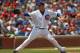 CHICAGO, IL - JULY 29: Starting pitcher Paul Maholm #28 of the Chicago Cubs delivers the ball against the St. Louis Cardinals at Wrigley Field on July 29, 2012 in Chicago, Illinois. (Photo by Jonathan Daniel/Getty Images)