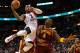 MIAMI, FL - FEBRUARY 07: Dwyane Wade #3 of the Miami Heat drives against Antawn Jamison #4 of the Cleveland Cavaliers during a game at American Airlines Arena on February 7, 2012 in Miami, Florida. NOTE TO USER: User expressly acknowledges and agrees that, by downloading and/or using this Photograph, User is consenting to the terms and conditions of the Getty Images License Agreement. (Photo by Mike Ehrmann/Getty Images)