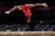 LONDON, ENGLAND - JULY 31: Gabrielle Douglas of the United States performs on the balance beam in the Artistic Gymnastics Women's Team final on Day 4 of the London 2012 Olympic Games at North Greenwich Arena on July 31, 2012 in London, England. (Photo by Jamie Squire/Getty Images)