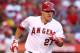 ANAHEIM, CA - JULY 28: Mike Trout #27 of the Los Angeles Angels of Anaheim runs to first on a fly ball hit to right field during the third inning against the Tampa Bay Rays at Angel Stadium of Anaheim on July 28, 2012 in Anaheim, California. (Photo by Josh Hedges/Getty Images)