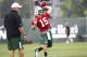 CORTLAND, NY - JULY 27: Tim Tebow #15 of the New York Jets works out in front of Tom Cavanaugh, quarterbacks coach at Jets Training Camp at SUNY Cortland on July 27, 2012 in Cortland, New York. (Photo by Jeff Zelevansky/Getty Images)