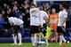 LIVERPOOL, ENGLAND - MARCH 10: Luka Modric of Tottenham Hotspur and his team mates show their dejection after conceding the opening goal during the Barclays Premier League match between Everton and Tottenham Hotspur at Goodison Park on March 10, 2012 in Liverpool, England. (Photo by Michael Regan/Getty Images)