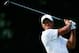 AKRON, OH - AUGUST 02: Tiger Woods plays a shot from the 14th tee during the first round of the World Golf Championships-Bridgestone Invitational at Firestone Country Club South Course on August 2, 2012 in Akron, Ohio. (Photo by Sam Greenwood/Getty Images)