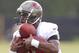 Sammie Stroughter shows how to catch THREE footballs. (Photo courtesy Buccaneers.com).