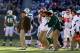 EAST RUTHERFORD, NJ - DECEMBER 11: Jim Leonhard #36 of the New York Jets leaves the field with an injury in the second quarter against the Kansas City Chiefs at MetLife Stadium on December 11, 2011 in East Rutherford, New Jersey. (Photo by Chris Trotman/Getty Images)
