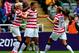 NEWCASTLE UPON TYNE, ENGLAND - AUGUST 03: Abby Wambach #14 of USA celebrates with her team-mates Megan Rapinoe (L) and Alex Morgan after scoring against New Zealand during the Women's Football Quarter Final match between United States and New Zealand, on Day 7 of the London 2012 Olympic Games at St James' Park on August 3, 2012 in Newcastle upon Tyne, England. (Photo by Stanley Chou/Getty Images)