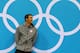 LONDON, ENGLAND - AUGUST 03: Gold medallist Michael Phelps of the United States looks on, on the podium during the medal ceremony for the Men's 100m Butterfly Final on Day 7 of the London 2012 Olympic Games at the Aquatics Centre on August 3, 2012 in London, England. (Photo by Al Bello/Getty Images)