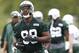 FLORHAM PARK, NJ - MAY 04: Quinton Coples #98 of the New York Jets works out during the Jets Rookie Minicamp on May 4, 2012 in Florham Park, New Jersey. (Photo by Jeff Zelevansky/Getty Images)