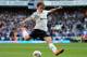 LONDON, ENGLAND - APRIL 01: Luka Modric of Spurs takes a shot during the Barclays Premier League match between Tottenham Hotspur and Swansea City at White Hart Lane on April 1, 2012 in London, England. (Photo by Mike Hewitt/Getty Images)