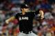 WASHINGTON, DC - AUGUST 03: Josh Johnson #55 of the Miami Marlins throws a pitch against the Washington Nationals during a game at Nationals Park on August 3, 2012 in Washington, DC. (Photo by Patrick McDermott/Getty Images)