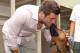 June 17, 2012; San Diego, CA, USA; New York Jets quarterback Tim Tebow with his dog Bronx before a Father's Day worship service at Qualcomm Stadium. Mandatory Credit: Jake Roth-US PRESSWIRE