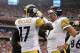 GLENDALE, AZ - OCTOBER 23: Wide receiver Mike Wallace #17 of the Pittsburgh Steelers talks with Ben Roethlisberger #7 after scoring on a 95 touchdown reception against the Arizona Cardinals during the second quarter of the NFL game at the University of Phoenix Stadium on October 23, 2011 in Glendale, Arizona. The Steelers defeated the Cardinals 32-20. (Photo by Christian Petersen/Getty Images)